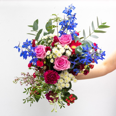 Sarah - 'Sarah' meaning 'Princess' perfectly describes this gorgeous hand tied bouquet fit for royalty! A stunning mix of delphiniums, roses and chrysanthemum.
