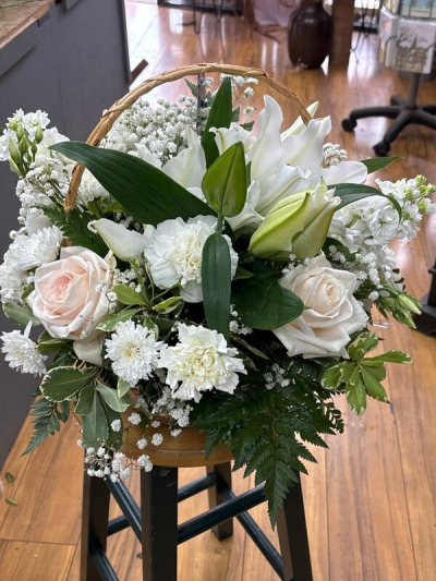 Whites and Greens Basket - A Beautiful basket arrangement in whites and greens that includes gyp, lilies, roses, carnations and stunning local grown stocks.