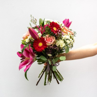 Celebration - A beautiful selection of stems some of which being gorgeous fresh scented lilies and roses.
