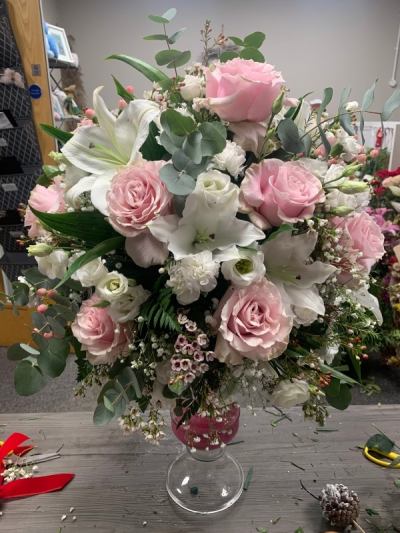 Vased funeral arrangement - Gorgeous vased funeral arrangement, with the beautiful colour scheme of pinks and whites with lilies, roses, wax flower, eucalyptus, lisianthks, carnations and more.