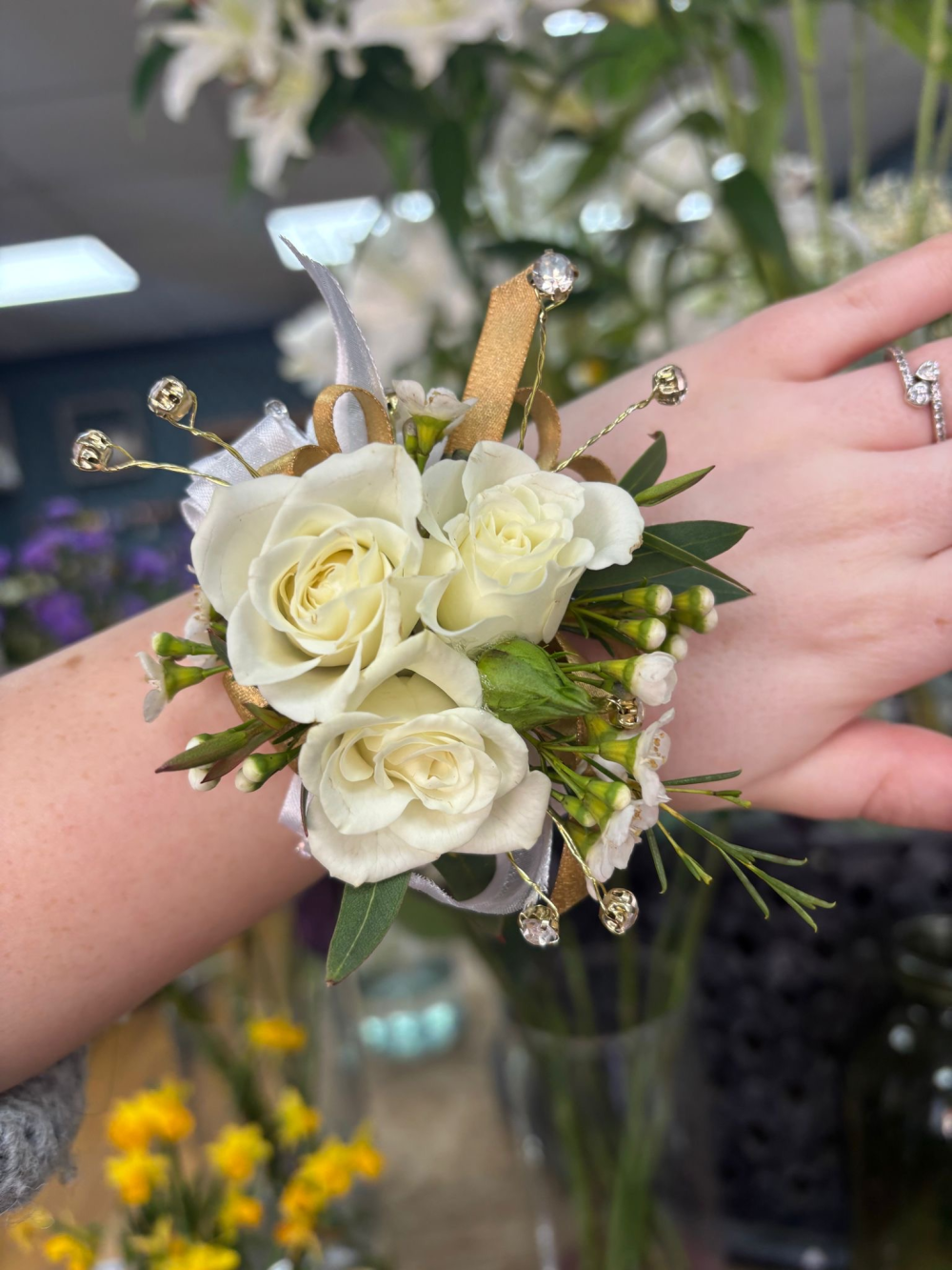 Rose and waxflower corsage